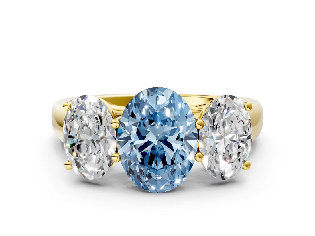 Yellow gold Fancy Blue Oval Cut Three-Stone Diamond Ring with Prong Setting on a Classic Band_12