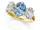 Yellow gold Fancy Blue Oval Cut Three-Stone Diamond Ring with Prong Setting on a Classic Band_13