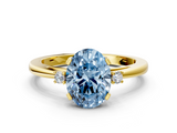 Yellow gold Fancy Blue Oval  Cut Three-Stone Solitaire Ring with Round Accent Diamonds and Four-Prong Setting_17