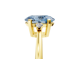 Yellow gold Fancy Blue Oval  Cut Three-Stone Solitaire Ring with Round Accent Diamonds and Four-Prong Setting_22