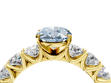 Yellow gold Fancy Blue Oval  Diamond Prong Setting with Side Stones on a Pave Band_140