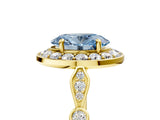 Yellow gold Fancy Blue Oval  Halo Diamond Engagement Ring with Twisted Band and Four-Prong Setting