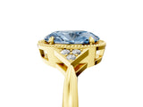 Yellow gold Fancy Blue Oval  Halo Diamond Ring with Tapered Band and Four-Prong Setting_12