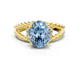 Yellow gold Fancy Blue Oval  Halo Twisted Band Four-Prong Ring_52