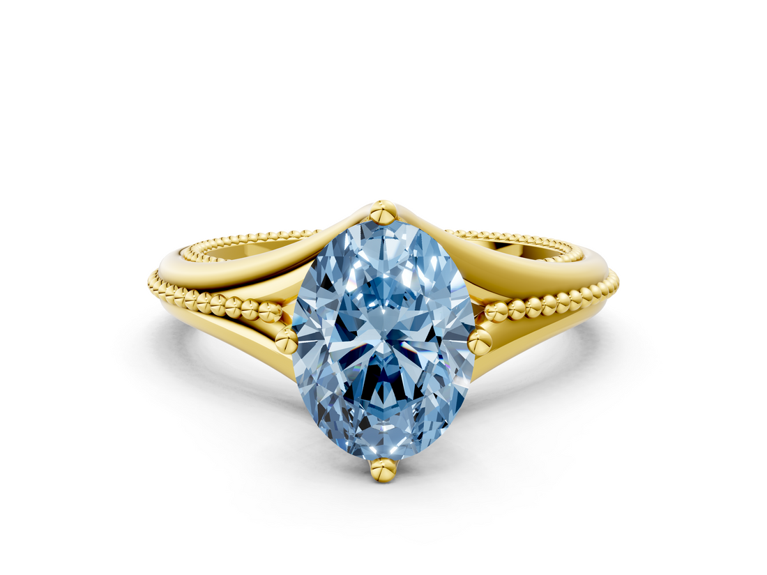 Yellow gold Fancy Blue Oval  Solitaire Beaded Band Six-Prong Setting