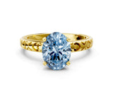 Yellow gold Fancy Blue Oval  Solitaire Diamond Engagement Ring with XO Engraved Band and Four-Prong Setting 1