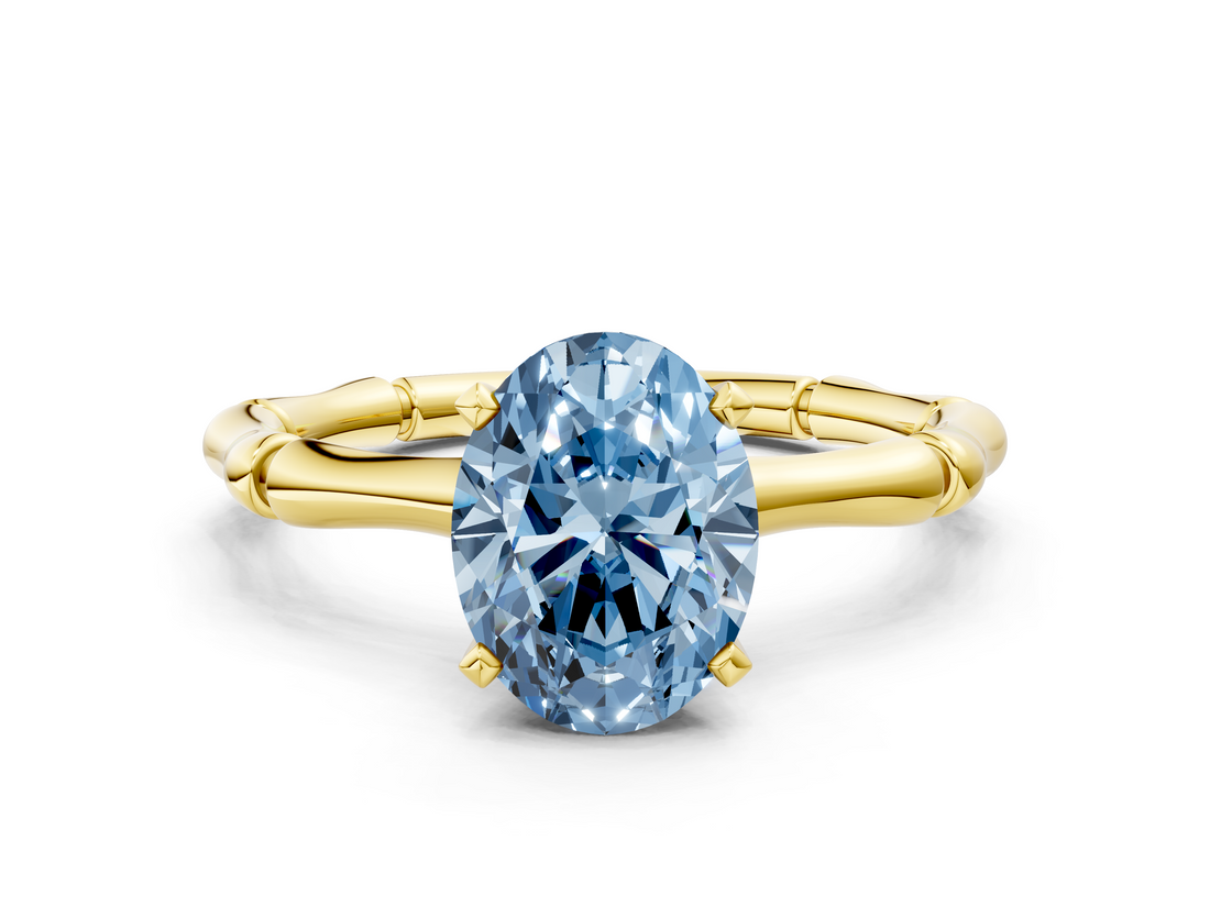 Yellow gold Fancy Blue Oval  Solitaire Diamond Ring with Bamboo Band and Four-Prong Setting_34