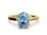 Yellow gold Fancy Blue Oval  Solitaire Diamond Ring with Four-Prong Setting and Tapered Band