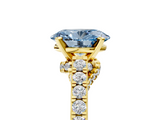 Yellow gold Fancy Blue Oval  Solitaire Diamond Ring with Pavé Band and Four-Prong Setting_170