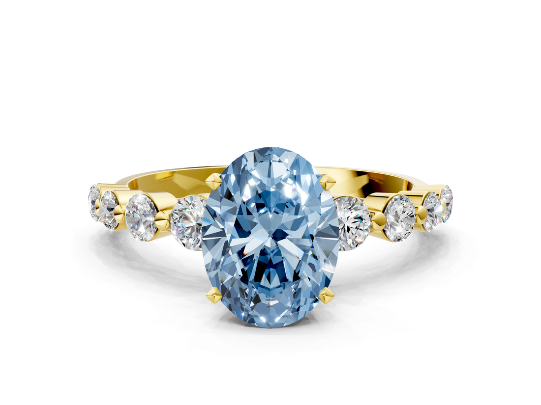 Yellow gold Fancy Blue Oval  Solitaire Diamond Ring with Pave Band and Four-Prong Setting_252