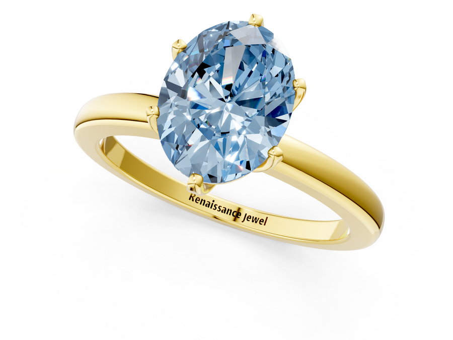 Yellow gold Fancy Blue Oval  Solitaire Diamond Ring with Six-Prong Setting on a Classic Band