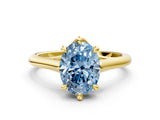 Yellow gold Fancy Blue Oval  Solitaire Engagement Ring with Six-Prong Setting and Classic Band 1