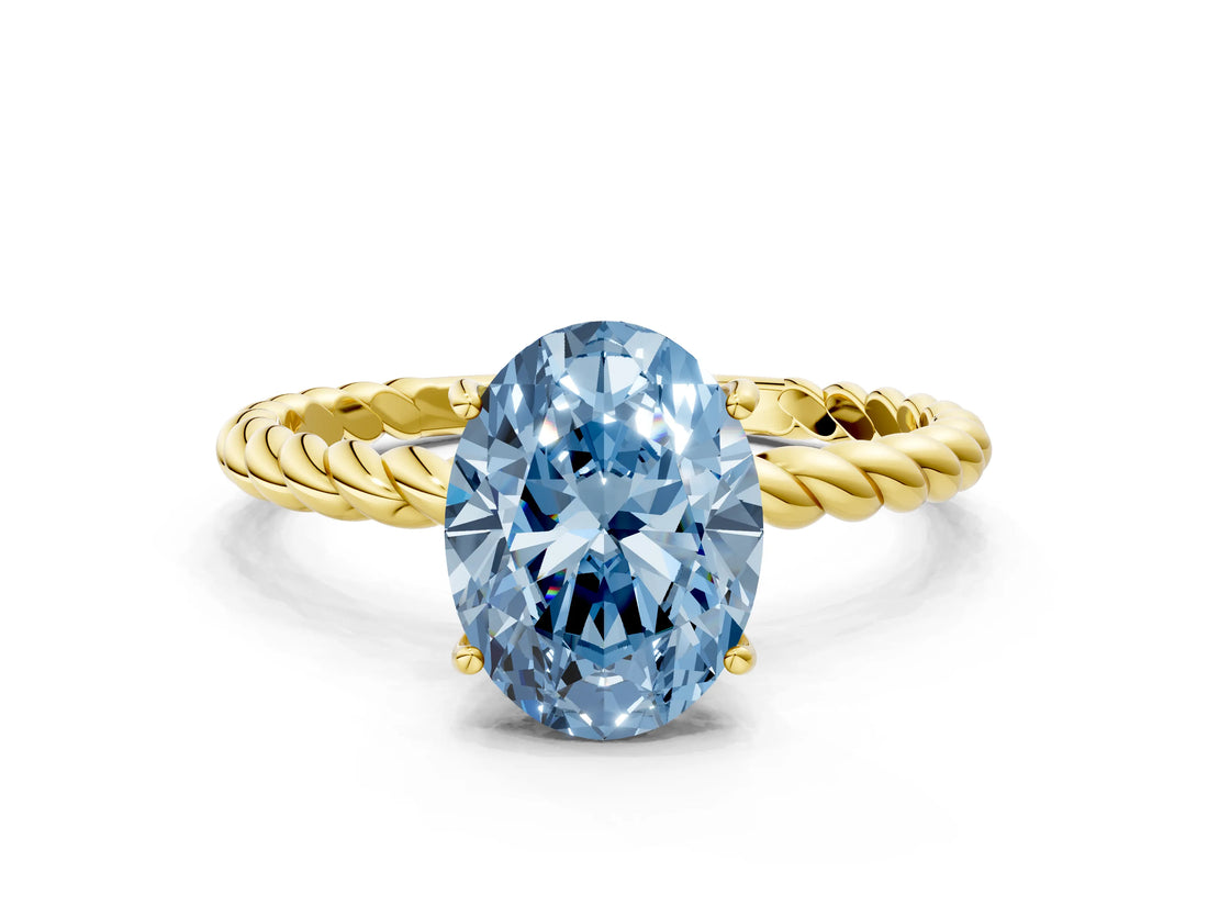 Yellow gold Fancy Blue Oval  Solitaire Twist Band Ring with Four-Prong Setting_68