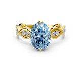 Yellow gold Fancy Blue Oval  Solitaire Twist Band with Leaf Prong Setting 1