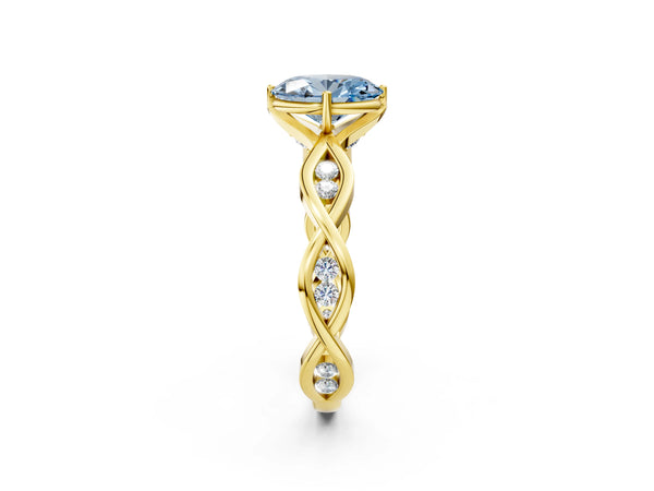 Yellow gold Fancy Blue Oval  Solitaire Twist Band with Leaf Prong Setting