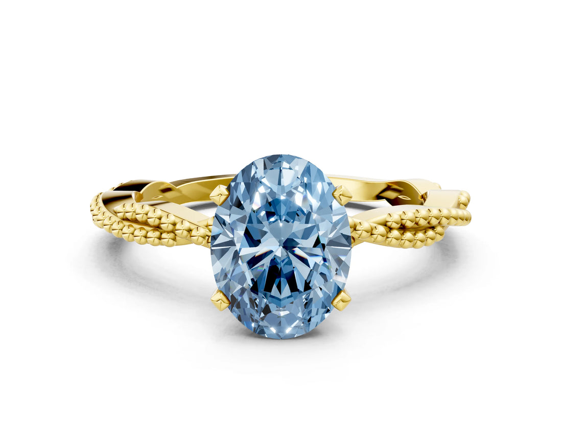 Yellow gold Fancy Blue Oval  Solitaire Twisted Band with Bead Prong Setting_401