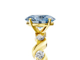 Yellow gold Fancy Blue Oval  Solitaire Twisted Band with Prong Setting