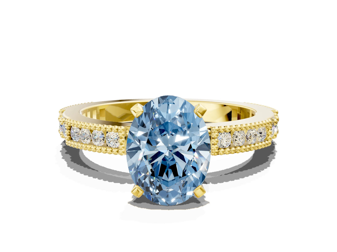 Yellow gold Fancy Blue Oval  Solitaire with Pavé Band and Four-Prong Setting_317