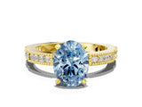 Yellow gold Fancy Blue Oval  Solitaire with Pavé Band and Four-Prong Setting_317