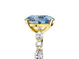 Yellow gold Fancy Blue Oval  Solitaire with Side Stones on a Pavé Band and Four-Prong Setting_28