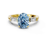Yellow gold Fancy Blue Oval  Solitaire with Tapered Baguette Side Stones on a Classic Band with Four-Prong Setting_88