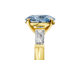 Yellow gold Fancy Blue Oval  Solitaire with Tapered Baguette Side Stones on a Classic Band with Four-Prong Setting_93