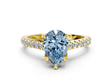 Yellow gold Fancy Blue Pear  Brilliant Diamond Solitaire with Pavé Band and Four-Prong Setting