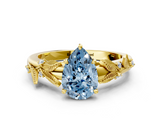 Yellow gold Fancy Blue Pear  Brilliant Solitaire with Leaf Motif Band and Four-Prong Setting_63