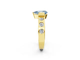 Yellow gold Fancy Blue Pear Cut Brilliant Channel-Set Diamond Ring with Bezel Prong Setting_2