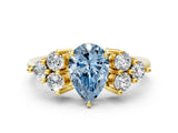 Yellow gold Fancy Blue Pear Cut Brilliant Diamond Cluster Accent Solitaire Ring with Prong Setting