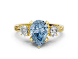 Yellow gold Fancy Blue Pear Cut Brilliant Three-Stone Diamond Ring with Pavé Band and Four-Prong Setting_3