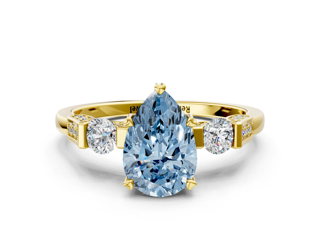 Yellow gold Fancy Blue Pear Cut Brilliant Three-Stone Pave Band with Four-Prong Setting