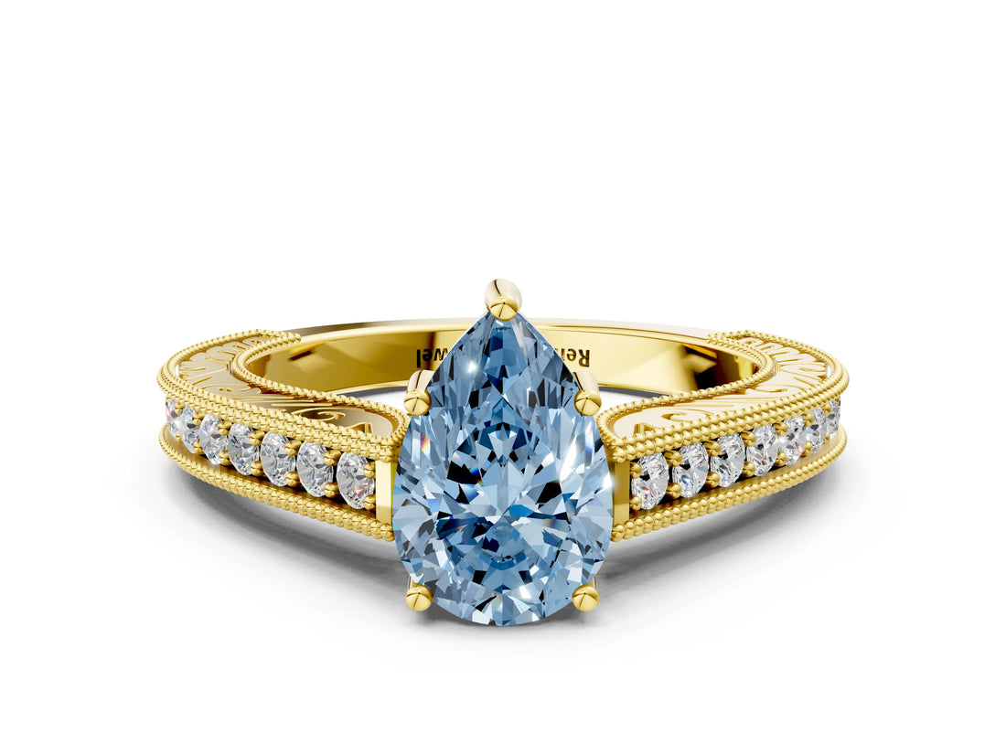 Yellow gold Fancy Blue Pear Cut Cut Pave Band Milgrain Solitaire Ring