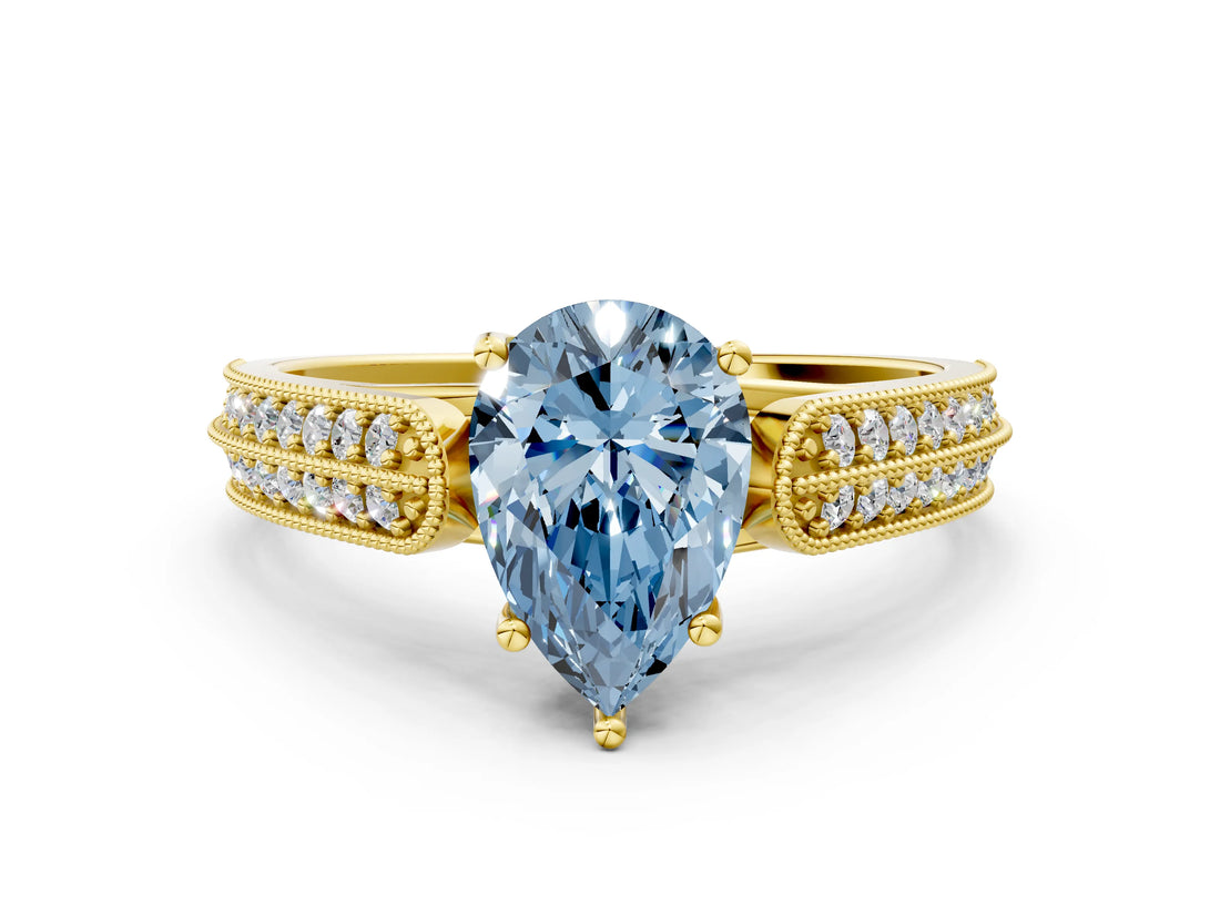 Yellow gold Fancy Blue Pear Cut Cut Pave Split Shank Engagement Ring with Four-Prong Setting