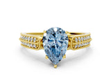 Yellow gold Fancy Blue Pear Cut Cut Pave Split Shank Engagement Ring with Four-Prong Setting