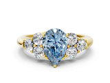Yellow gold Fancy Blue Pear  Cut Diamond Cluster Ring with Round Accent Stones and Prong Setting on a Classic Band_78
