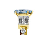 Yellow gold Fancy Blue Pear Cut Diamond Engagement Ring with Baguette Side Stones and Channel Set Band_24