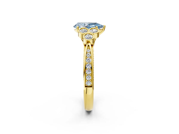 Yellow gold Fancy Blue Pear  Cut Diamond Engagement Ring with Bezel Set Round Side Stones and Prong Setting