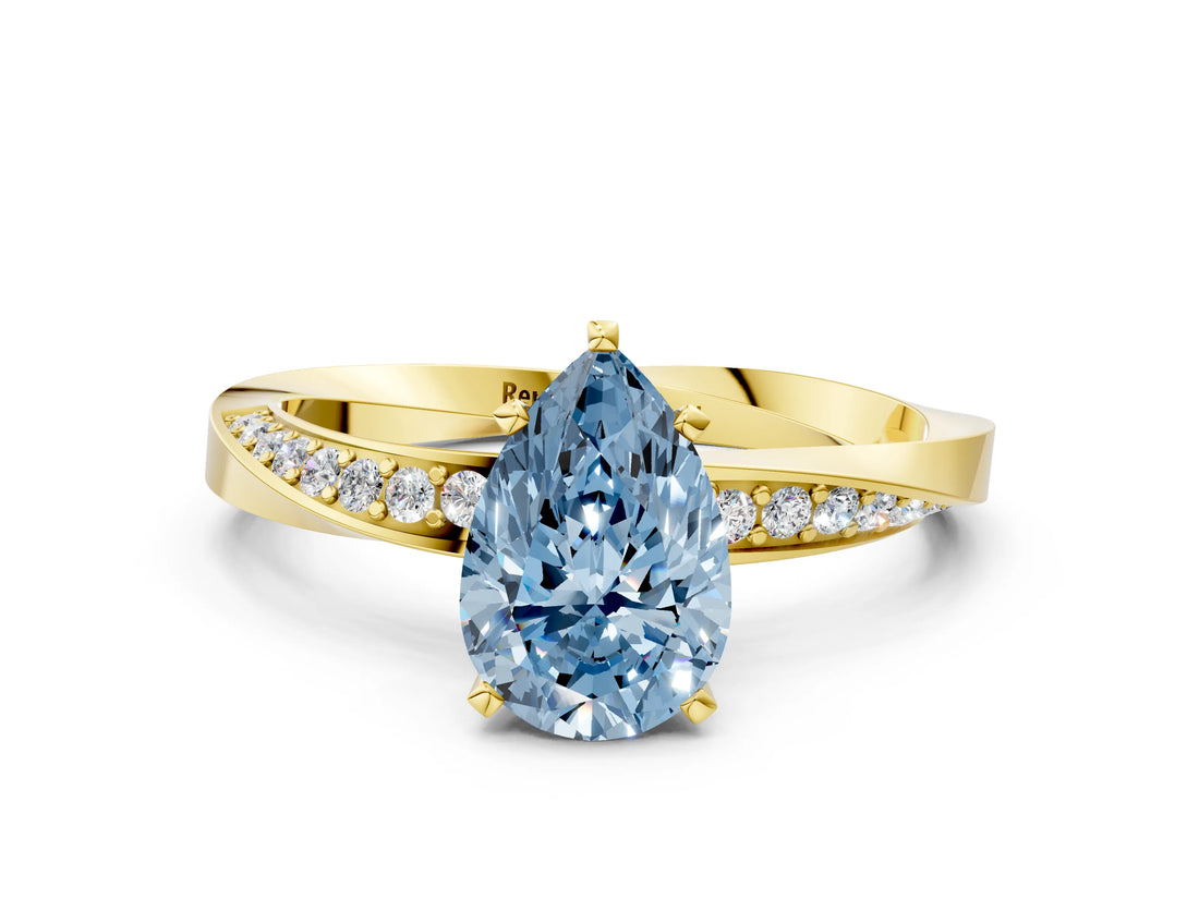 Yellow gold Fancy Blue Pear Cut Diamond Engagement Ring with Side Stone Accents and Four-Prong Setting_60