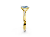 Yellow gold Fancy Blue Pear Cut Diamond Engagement Ring with Side Stone Accents and Four-Prong Setting_62