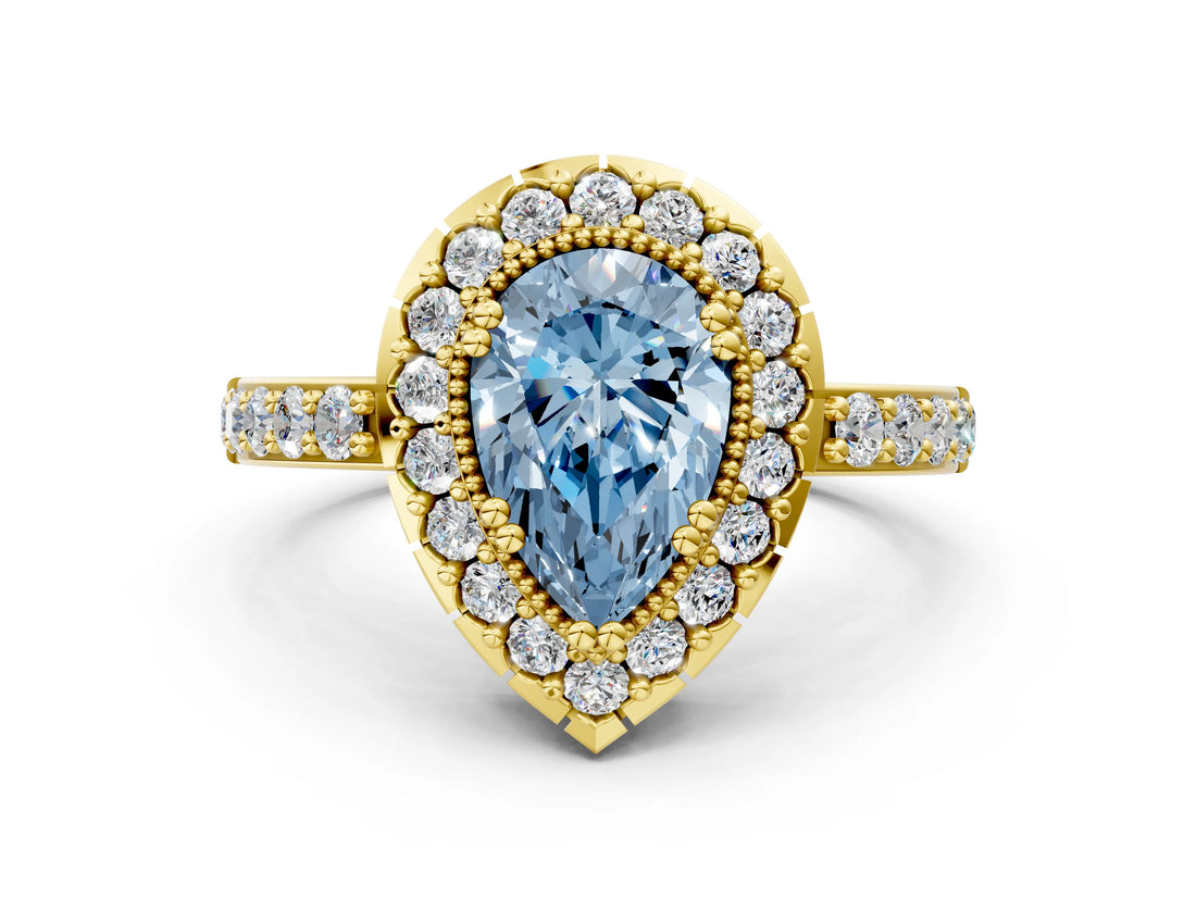 Yellow gold Fancy Blue Pear Cut Diamond Halo Ring with Pavé Band and Prong Setting