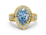 Yellow gold Fancy Blue Pear Cut Diamond Halo Ring with Split Shank and Bezel Accents and Prong Setting