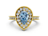 Yellow gold Fancy Blue Pear Cut Diamond Milgrain Halo Engagement Ring with Round Pavé Band and Prong Setting_12