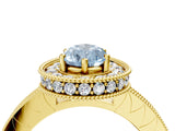 Yellow gold Fancy Blue Pear Cut Diamond Milgrain Halo Engagement Ring with Round Pavé Band and Prong Setting_16