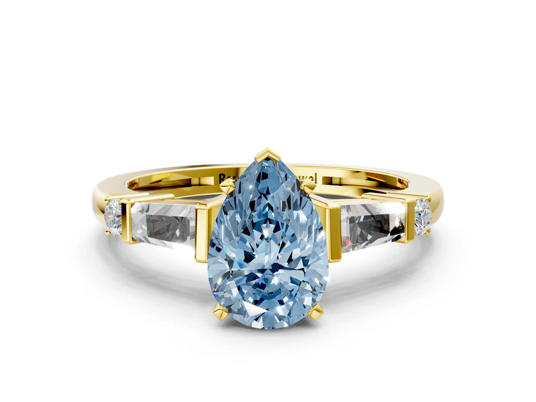 Yellow gold Fancy Blue Pear  Cut Diamond Ring with Baguette Side Stones, Channel Set Band, and Four-Prong Setting_24