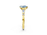 Yellow gold Fancy Blue Pear  Cut Diamond Ring with Baguette Side Stones, Channel Set Band, and Four-Prong Setting_26