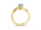 Yellow gold Fancy Blue Pear  Cut Diamond Ring with Baguette Side Stones, Channel Set Band, and Four-Prong Setting_6