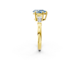 Yellow gold Fancy Blue Pear  Cut Diamond Ring with Tapered Baguette Side Stones in Four-Prong Setting_5