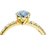 Yellow gold Fancy Blue Pear Cut Diamond Solitaire Pavé Engagement Ring with Round Band and Prong Setting_53
