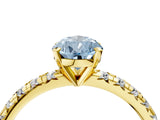 Yellow gold Fancy Blue Pear Cut Diamond Solitaire Pavé Engagement Ring with Round Band and Prong Setting_65